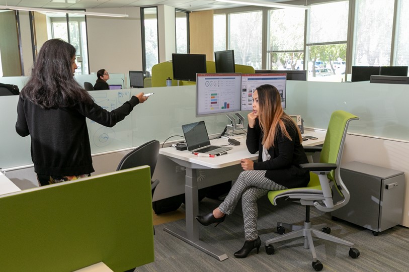 coworkers talking at the office